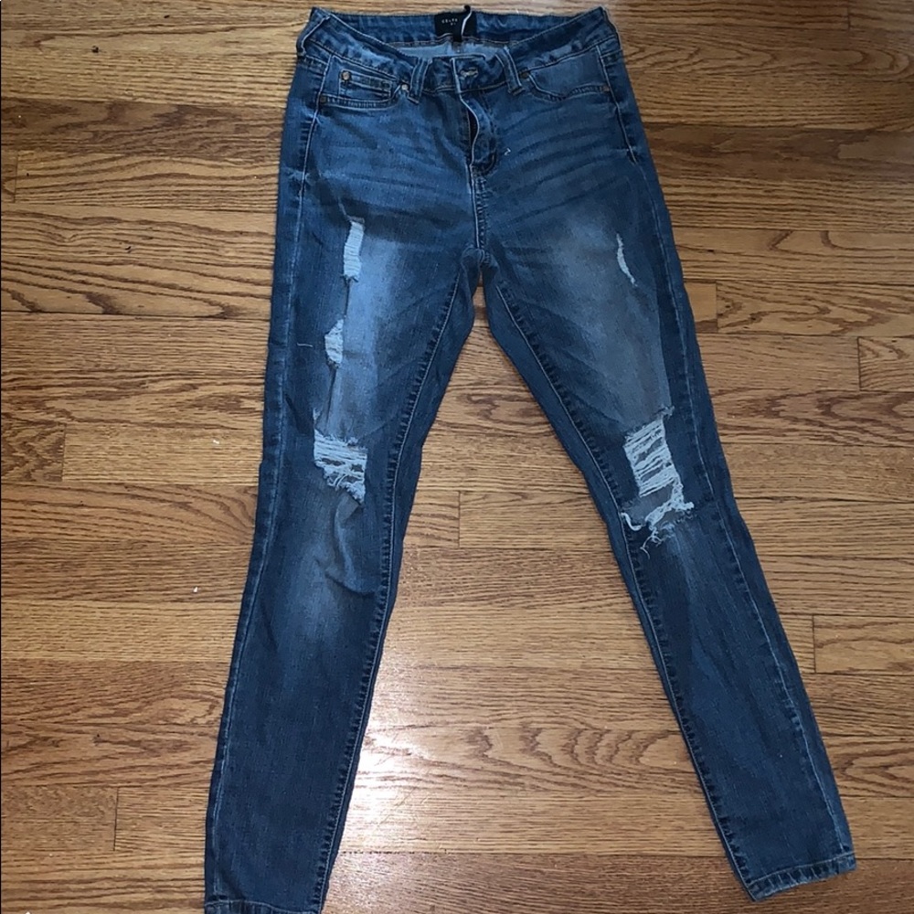 Ripped skinny blue jeans